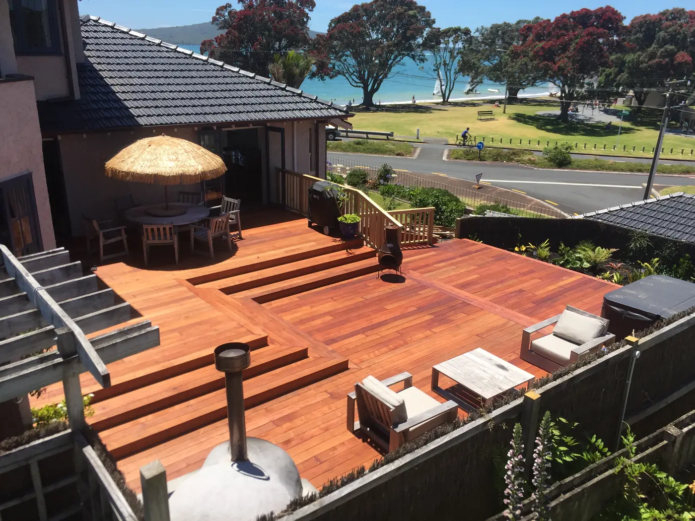 Kwila deck overlooking the beach by Custom Decks and Fences